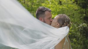 Bride and groom kiss at their south west wedding venue