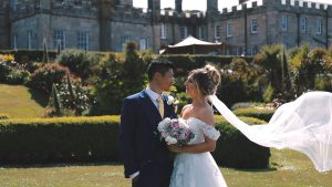 A capture of bride and groom from cinematic wedding film