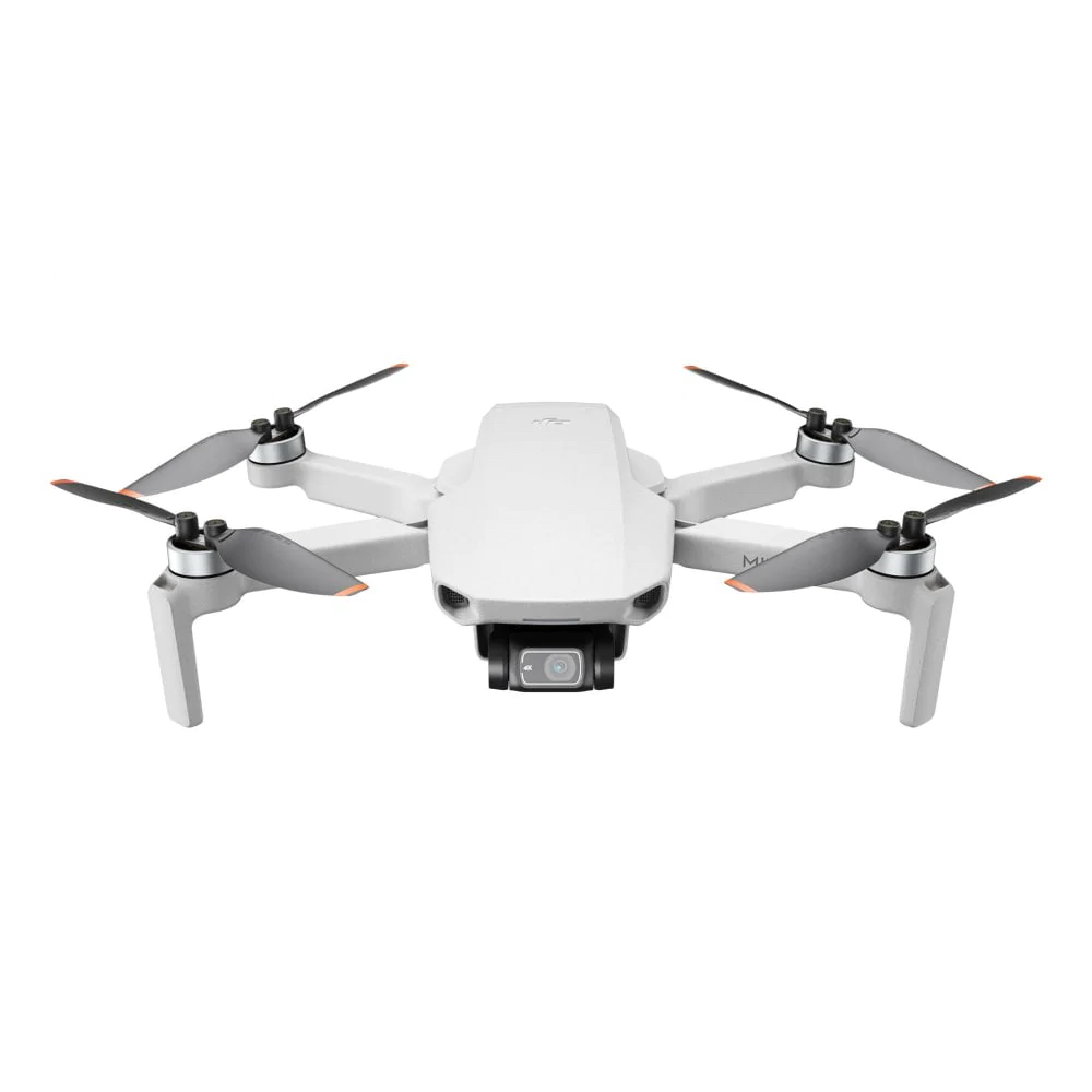Drone used for wedding videography and aerial filming, shown with mounted camera and four rotors on a neutral background