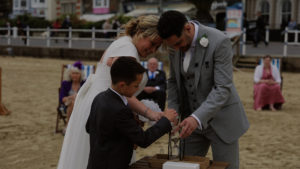 A beach sand ceremony is a unique wedding ceremony idea