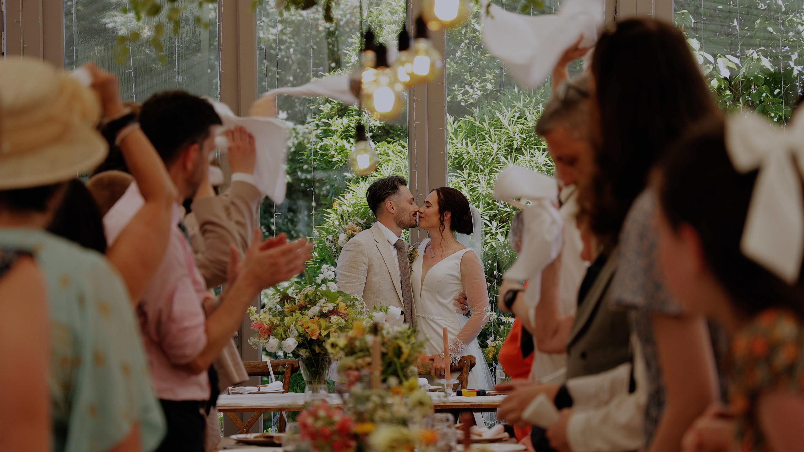 Beth & Kiaran Trevenna napkins entrance A groom picking up his happy bride at sunset in a field